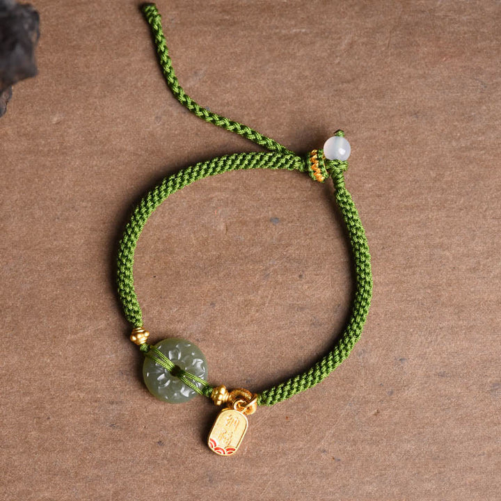 Bracelet en corde verte avec boucle de paix en jade vert et Buddha Stones