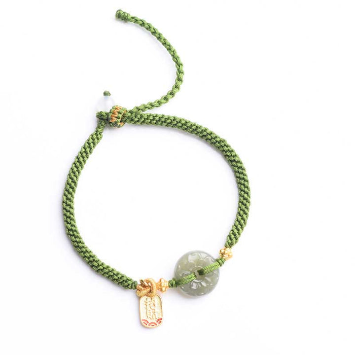 Bracelet en corde verte avec boucle de paix en jade vert et Buddha Stones