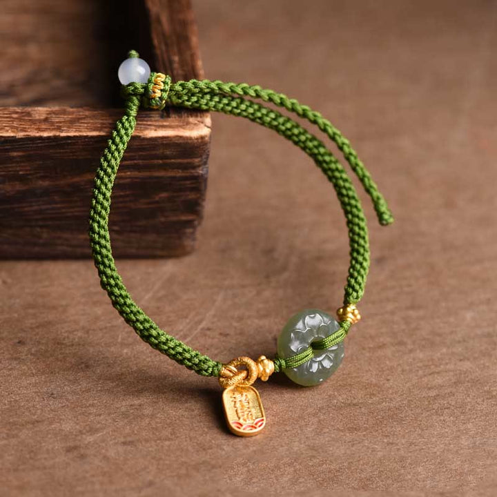 Bracelet en corde verte avec boucle de paix en jade vert et Buddha Stones