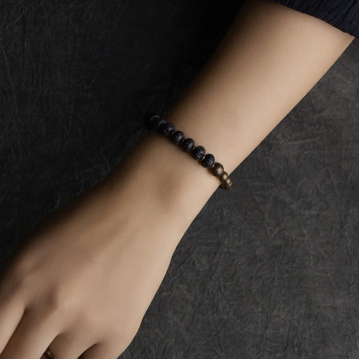 Bracelet en cuivre avec Buddha Stones absorbant l'énergie négative