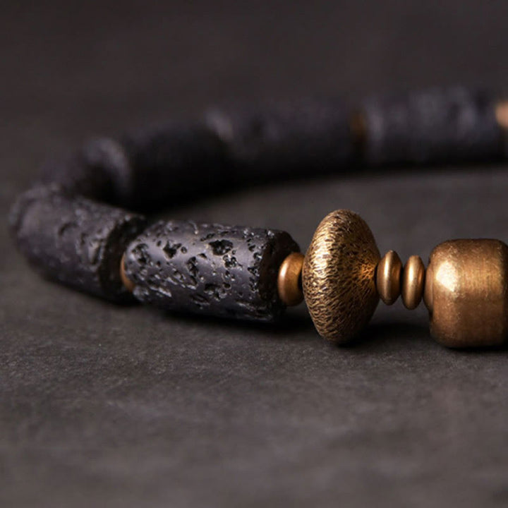 Bracelet en cuivre avec perles de lave noires et Buddha Stones