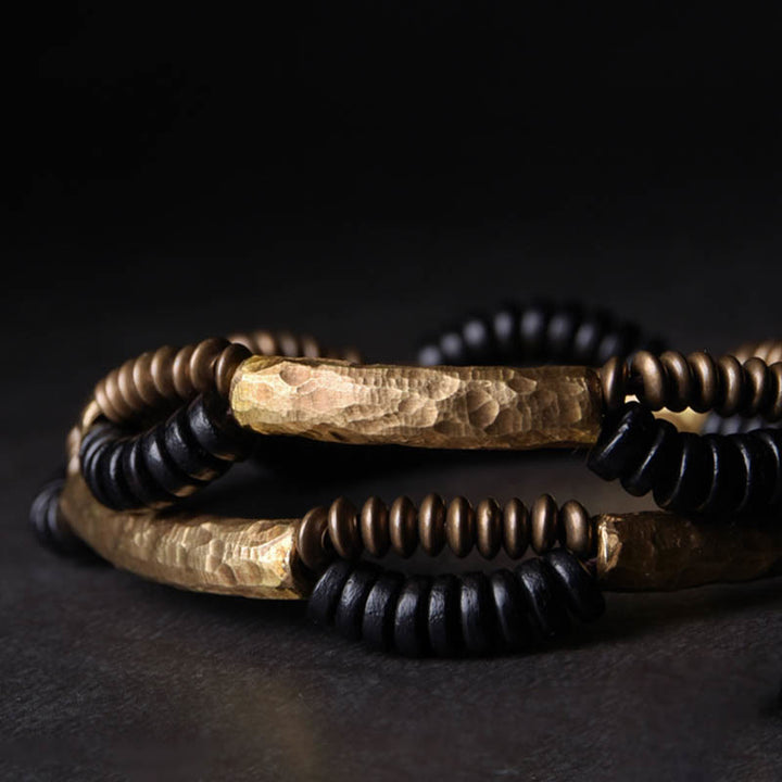Bracelet fait main en Buddha Stones vintage en bois d'ébène et cuivre pour la chance et la richesse