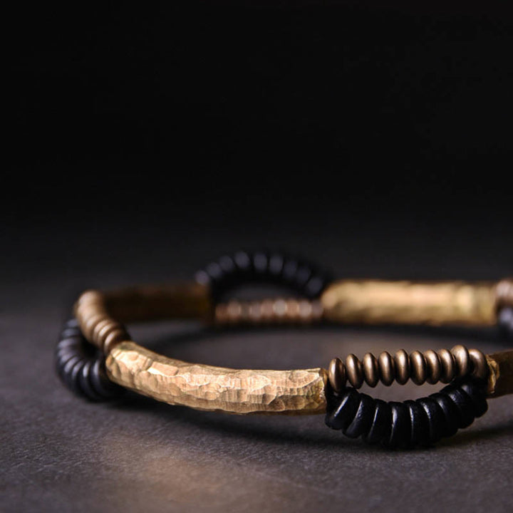 Bracelet fait main en Buddha Stones vintage en bois d'ébène et cuivre pour la chance et la richesse