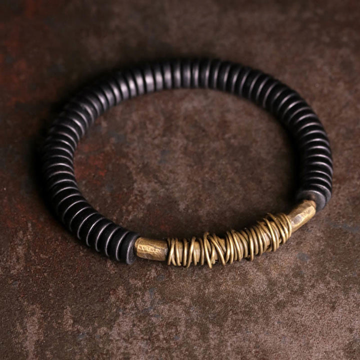 Bracelet en cuivre et bois d'ébène tibétain calme avec Buddha Stones