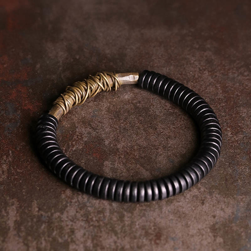 Bracelet en cuivre et bois d'ébène tibétain calme avec Buddha Stones