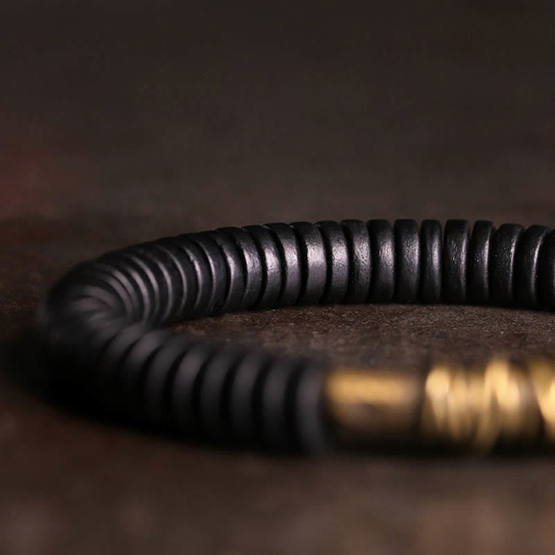 Bracelet en cuivre et bois d'ébène tibétain calme avec Buddha Stones