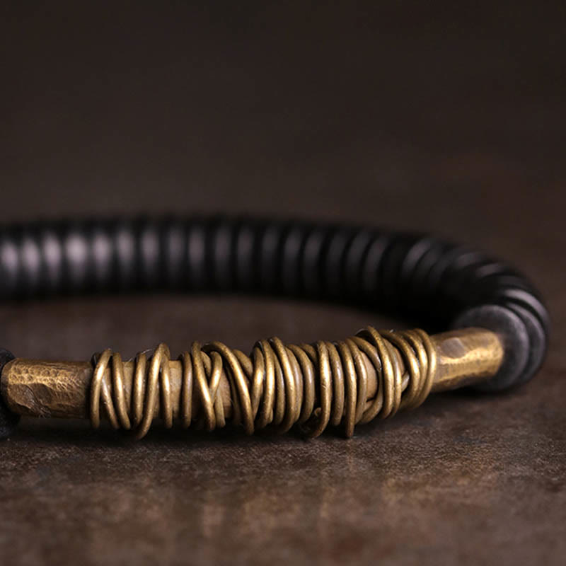 Bracelet en cuivre et bois d'ébène tibétain calme avec Buddha Stones