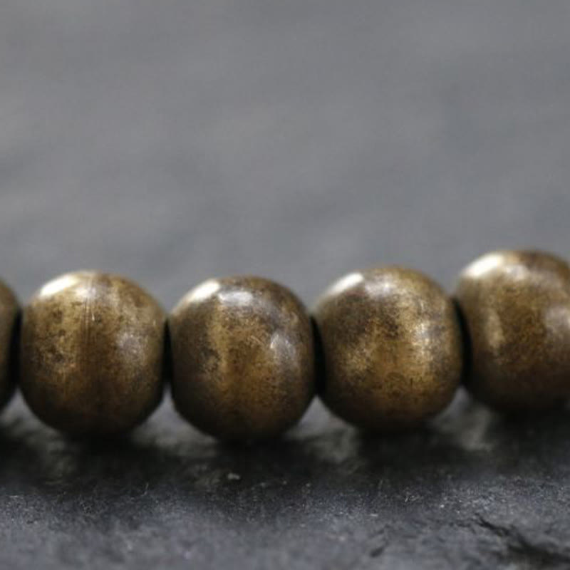 Bracelet simple en perles de cuivre et de laiton avec Buddha Stones