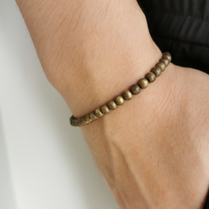 Bracelet simple en perles de cuivre et de laiton avec Buddha Stones