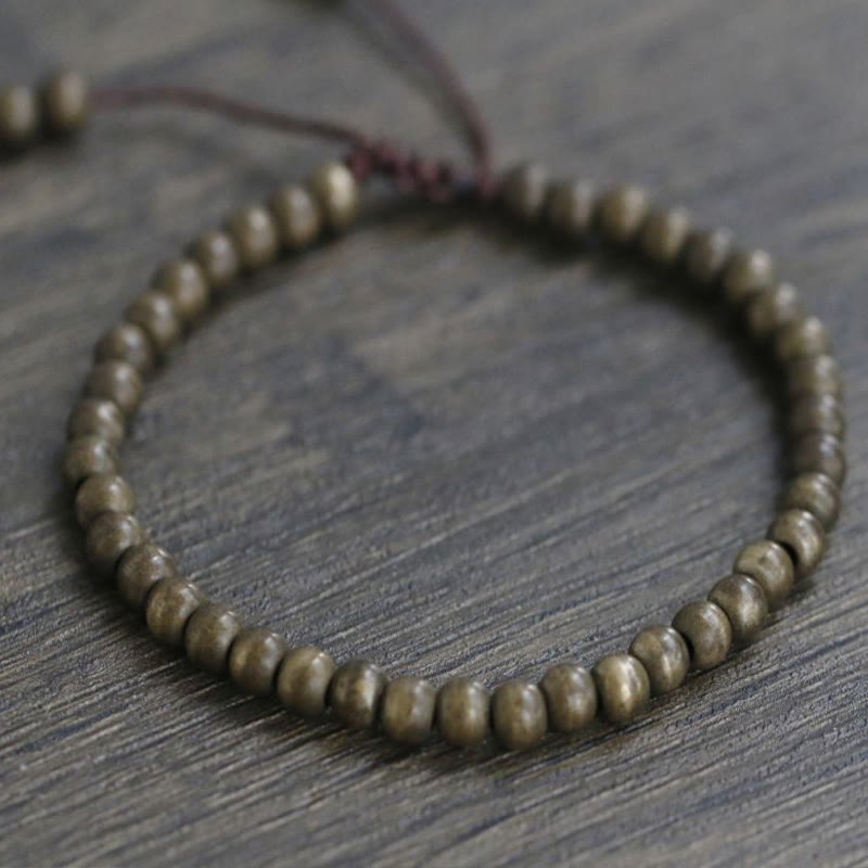 Bracelet simple en perles de cuivre et de laiton avec Buddha Stones