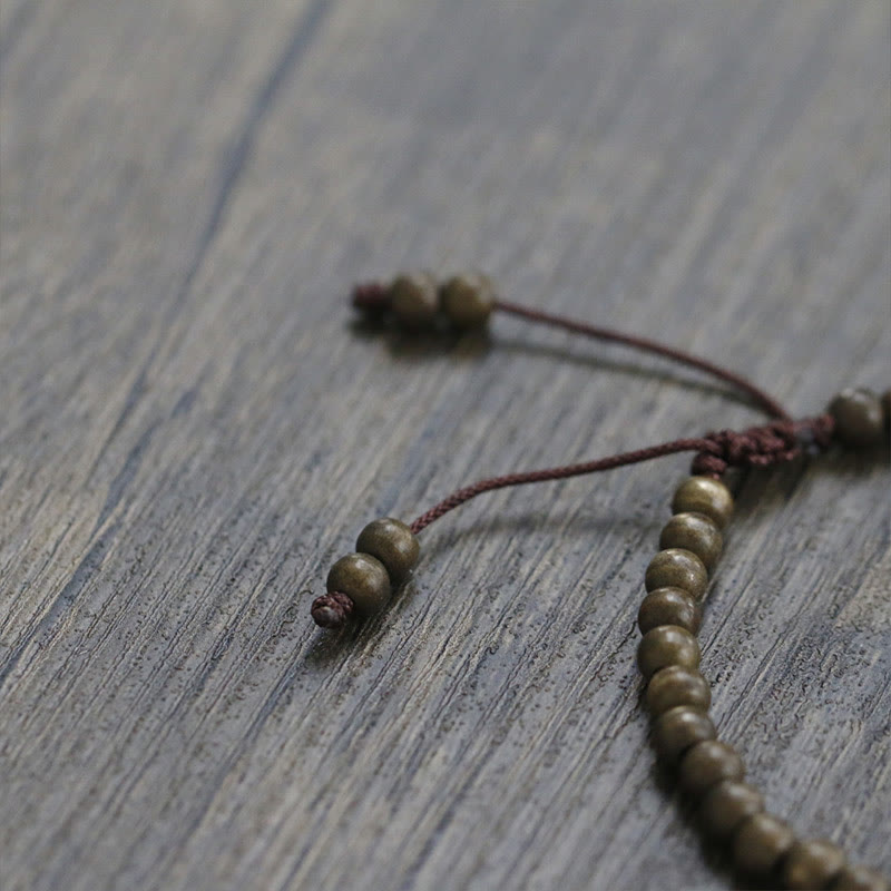 Bracelet simple en perles de cuivre et de laiton avec Buddha Stones
