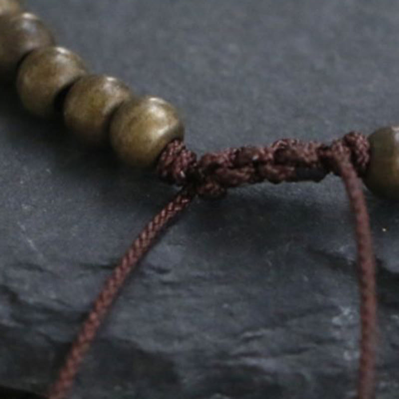 Bracelet simple en perles de cuivre et de laiton avec Buddha Stones