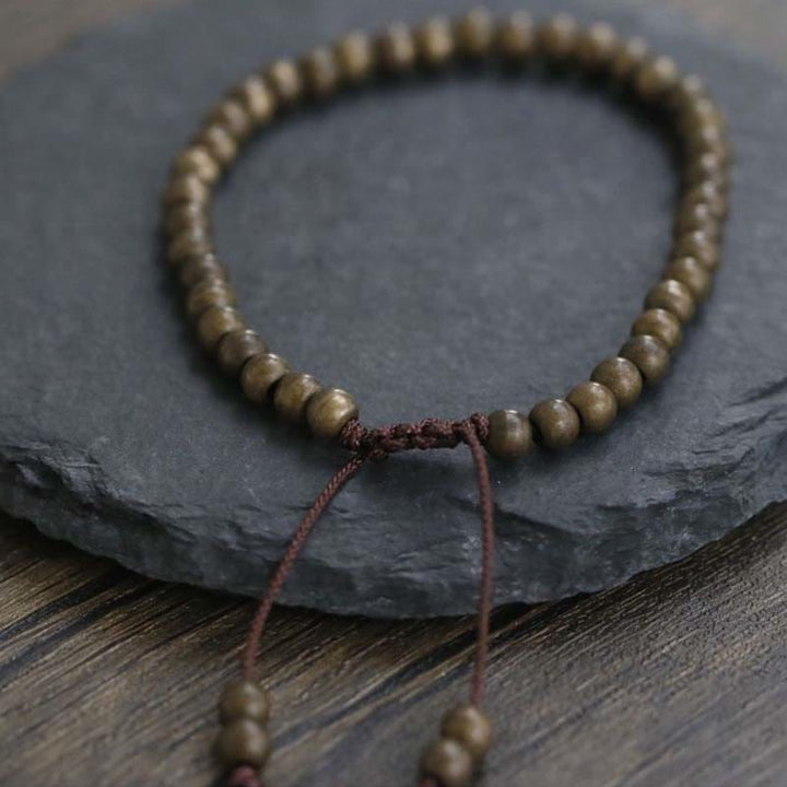 Bracelet simple en perles de cuivre et de laiton avec Buddha Stones