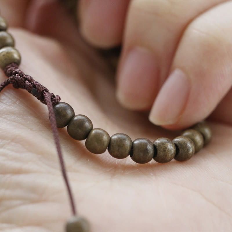 Bracelet simple en perles de cuivre et de laiton avec Buddha Stones