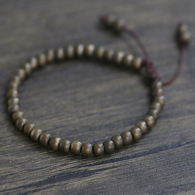 Bracelet simple en perles de cuivre et de laiton avec Buddha Stones