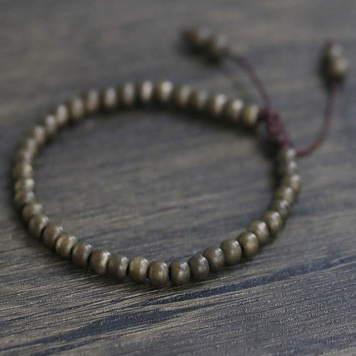 Bracelet simple en perles de cuivre et de laiton avec Buddha Stones