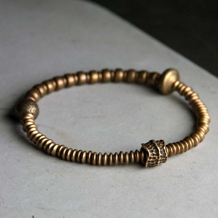 Bracelet en laiton Buddha Stones et équilibre en cuivre