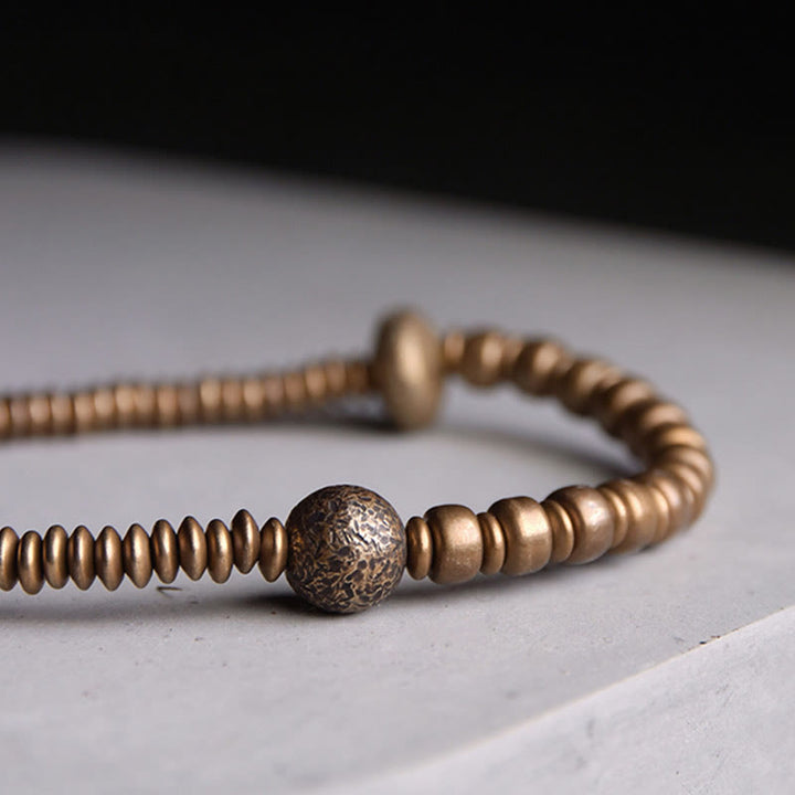 Bracelet en laiton Buddha Stones et équilibre en cuivre