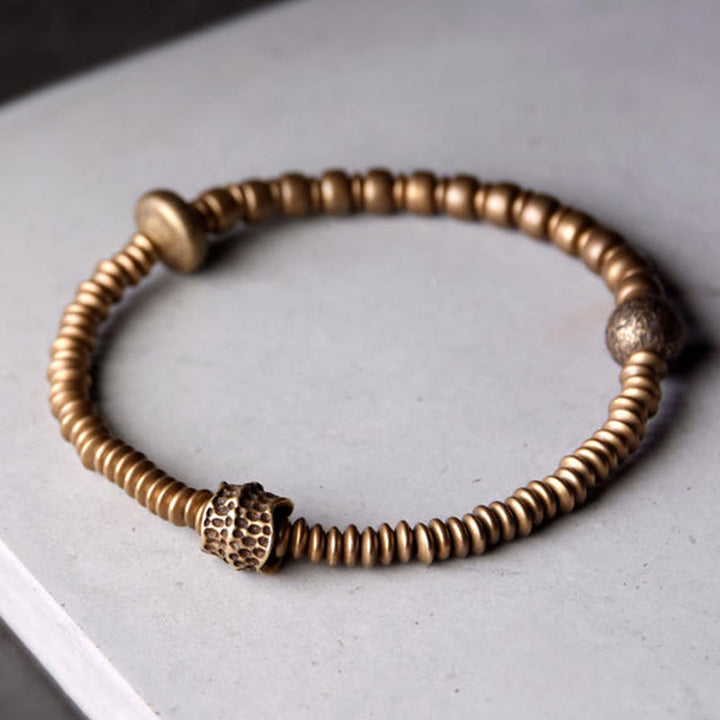 Bracelet en laiton Buddha Stones et équilibre en cuivre