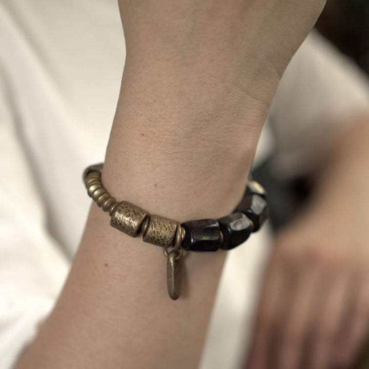 Bracelet de perles en cuivre et bois d'ébène avec Buddha Stones vintage Peace