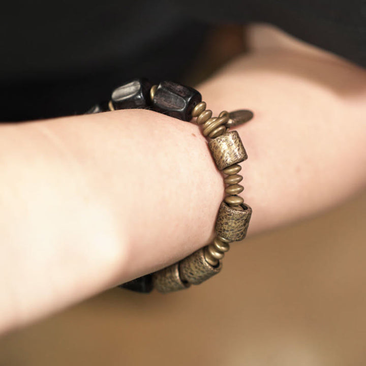 Bracelet de perles en cuivre et bois d'ébène avec Buddha Stones vintage Peace