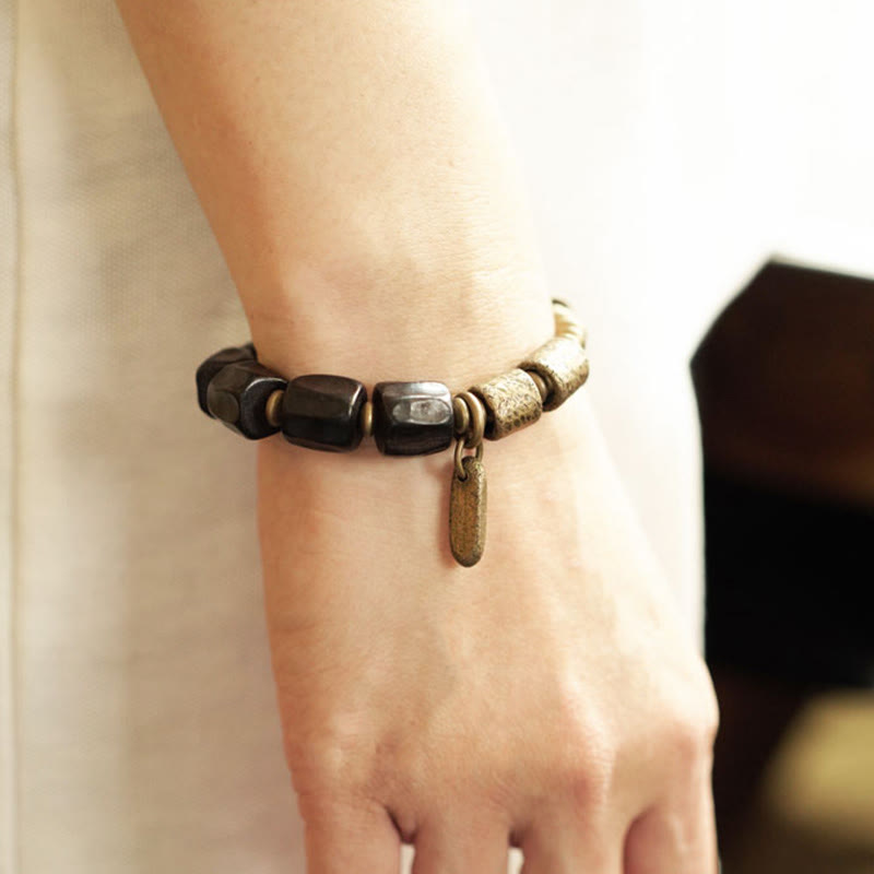 Bracelet de perles en cuivre et bois d'ébène avec Buddha Stones vintage Peace