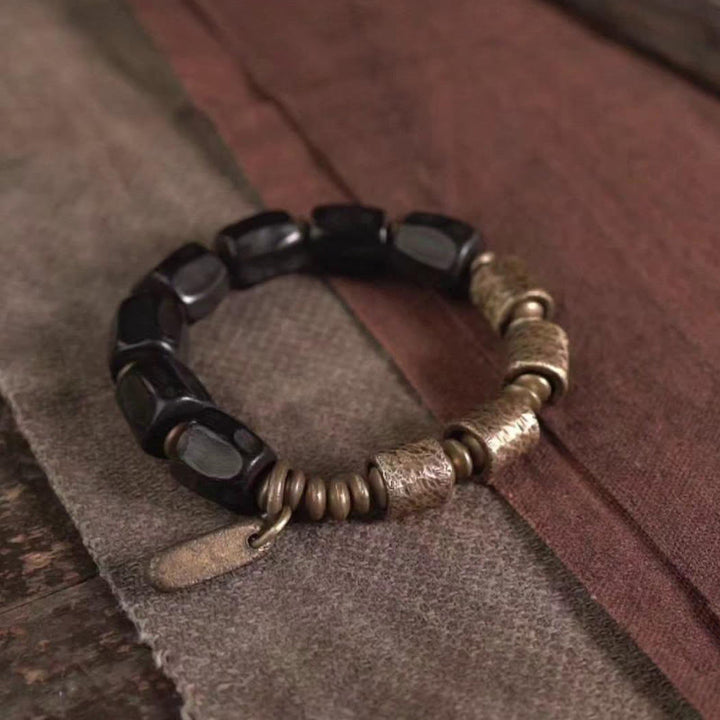 Bracelet de perles en cuivre et bois d'ébène avec Buddha Stones vintage Peace
