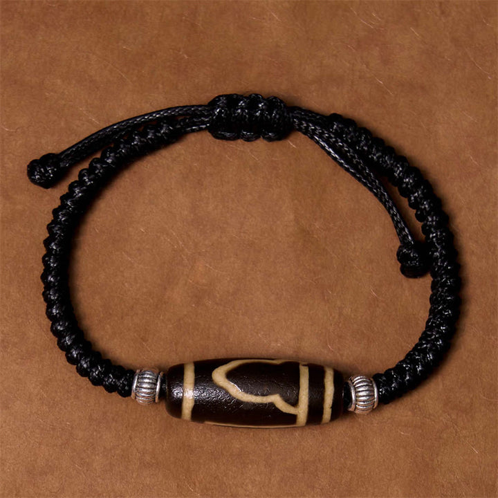 Bracelet en corde de protection de richesse Buddha Stones tibétaines à neuf yeux et à trois yeux