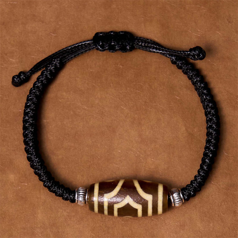 Bracelet en corde de protection de richesse Buddha Stones tibétaines à neuf yeux et à trois yeux