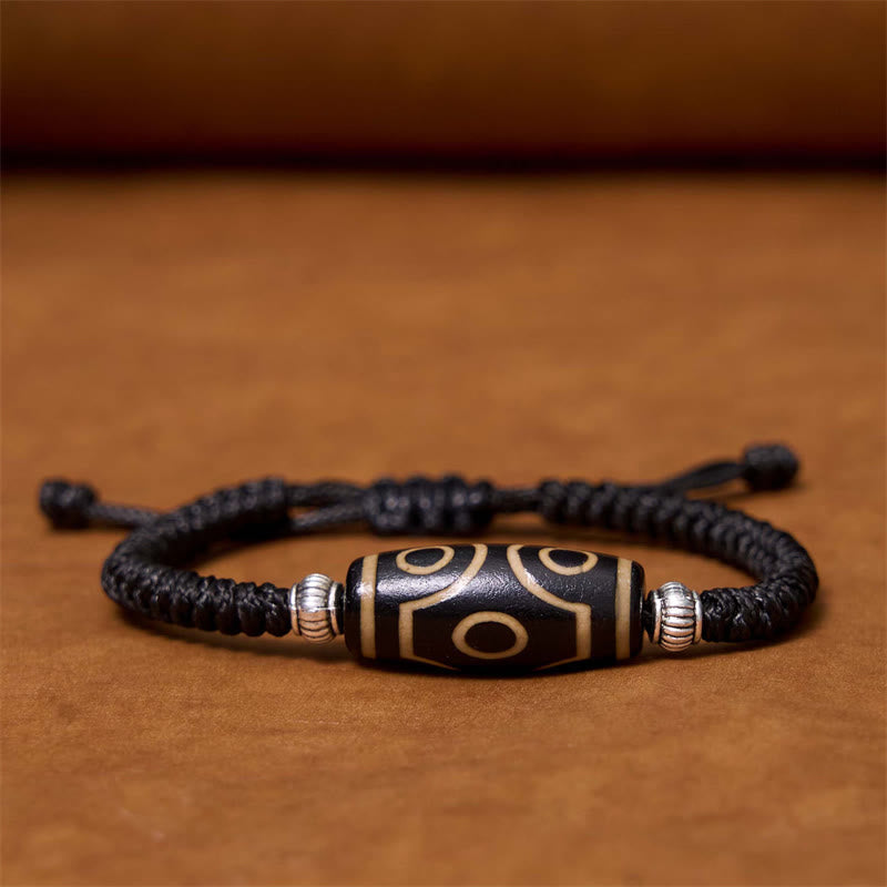Bracelet en corde de protection de richesse Buddha Stones tibétaines à neuf yeux et à trois yeux