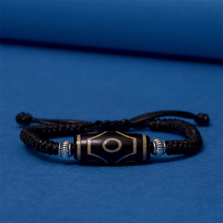 Bracelet en corde de protection de richesse Buddha Stones tibétaines à neuf yeux et à trois yeux