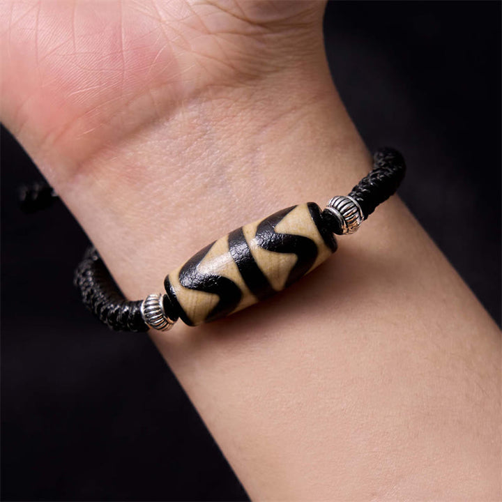 Bracelet en corde de protection de richesse Buddha Stones tibétaines à neuf yeux et à trois yeux