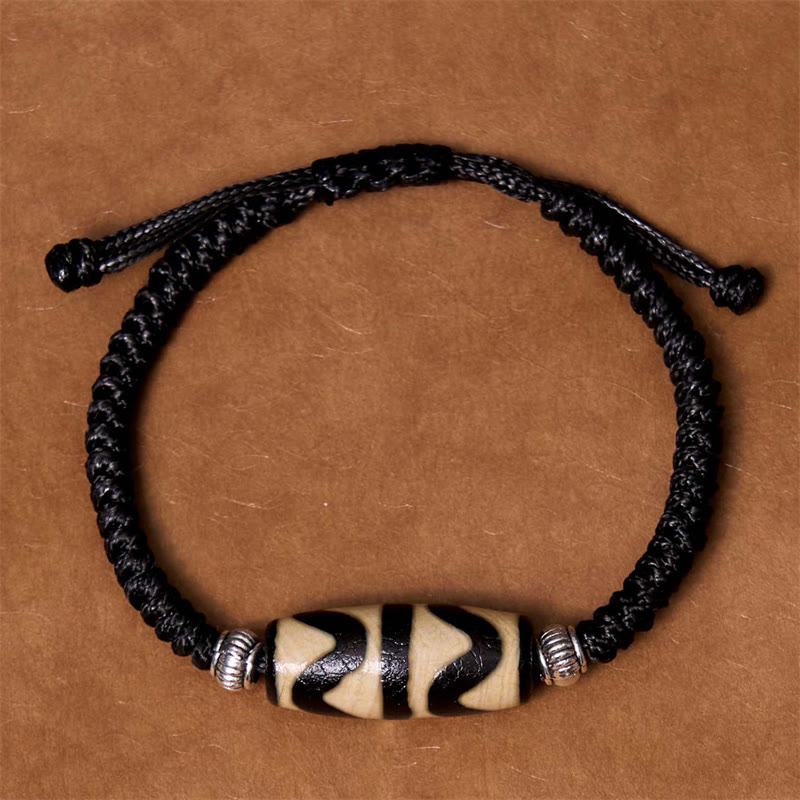 Bracelet en corde de protection de richesse Buddha Stones tibétaines à neuf yeux et à trois yeux