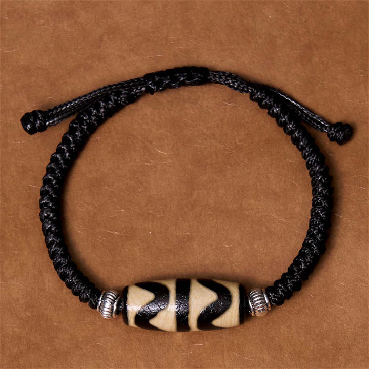 Bracelet en corde de protection de richesse Buddha Stones tibétaines à neuf yeux et à trois yeux