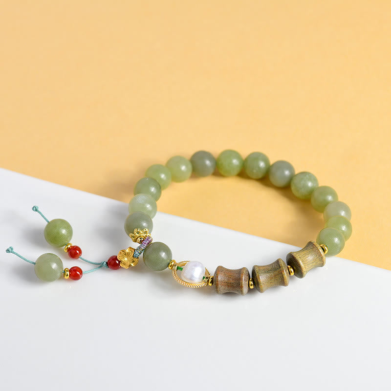 Bracelet de prospérité en jade, bois de santal, bambou et perles de Buddha Stones