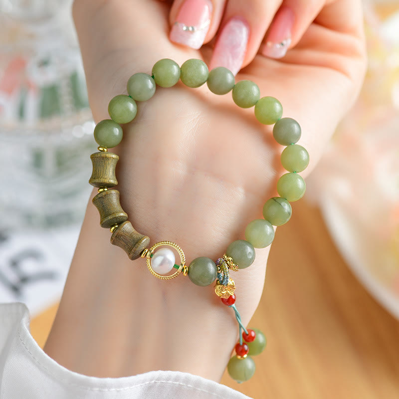Bracelet de prospérité en jade, bois de santal, bambou et perles de Buddha Stones