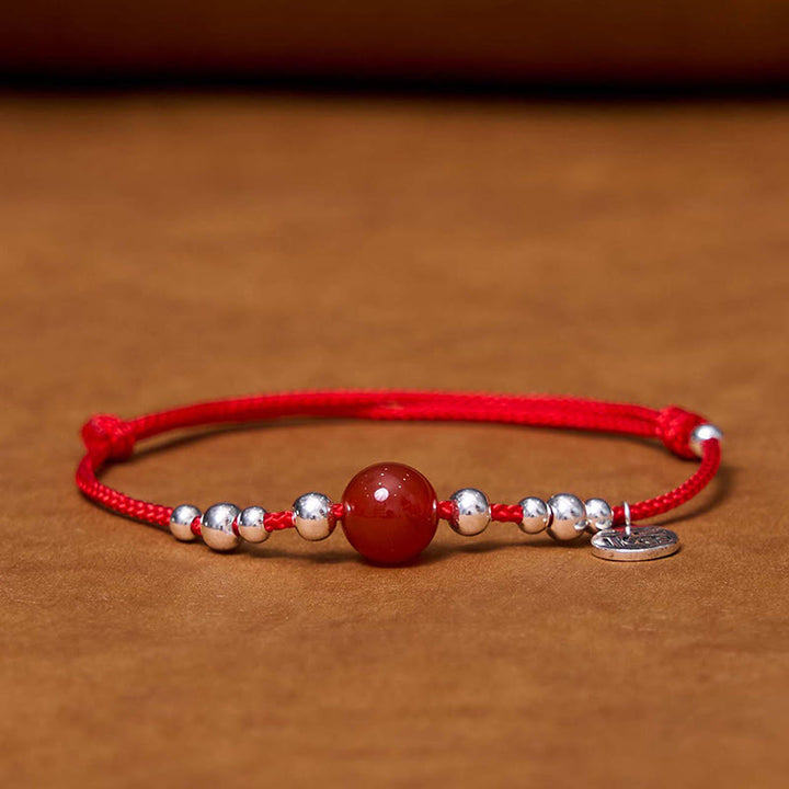 Bracelet en corde tressée ultra-mince en agate rouge avec personnage Fu en argent sterling 925 fait à la main par Buddha Stones