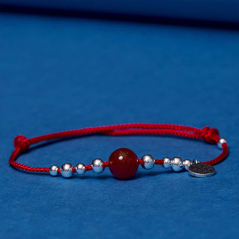 Bracelet en corde tressée ultra-mince en agate rouge avec personnage Fu en argent sterling 925 fait à la main par Buddha Stones