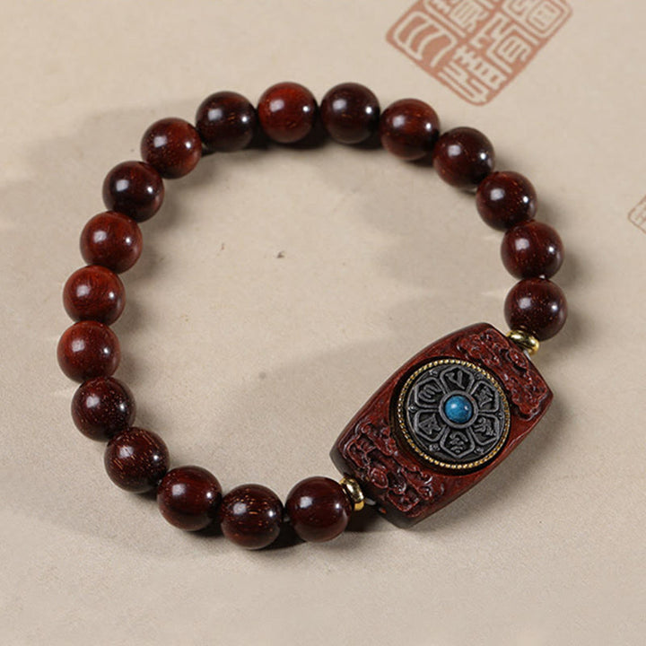 Bracelet de paix en six mots vrais en bois de santal rouge et vert avec petites feuilles de Buddha Stones