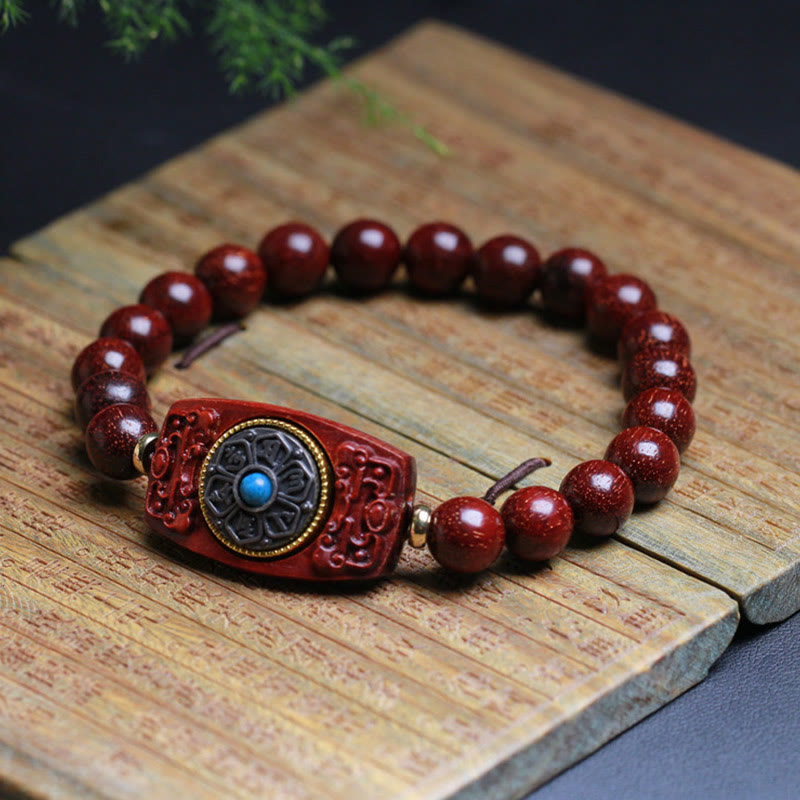 Bracelet de paix en six mots vrais en bois de santal rouge et vert avec petites feuilles de Buddha Stones