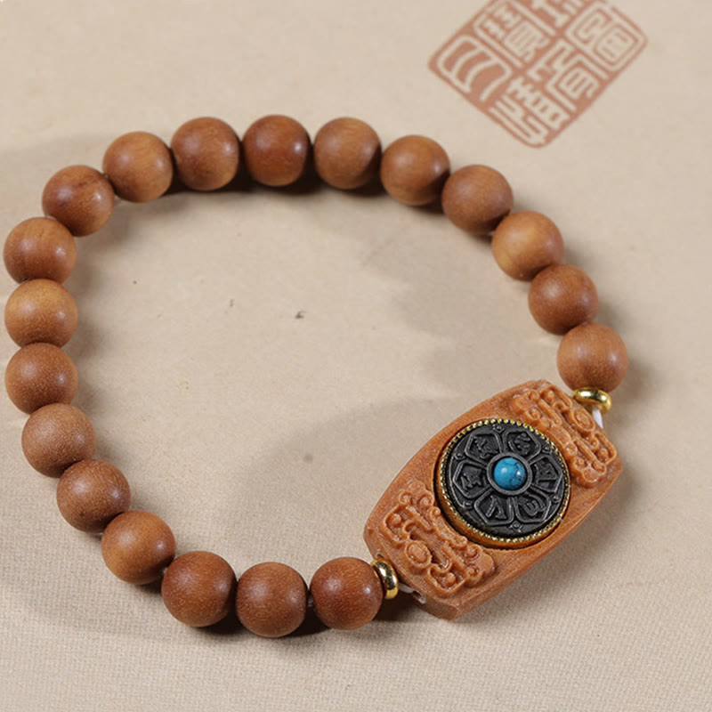 Bracelet de paix en six mots vrais en bois de santal rouge et vert avec petites feuilles de Buddha Stones