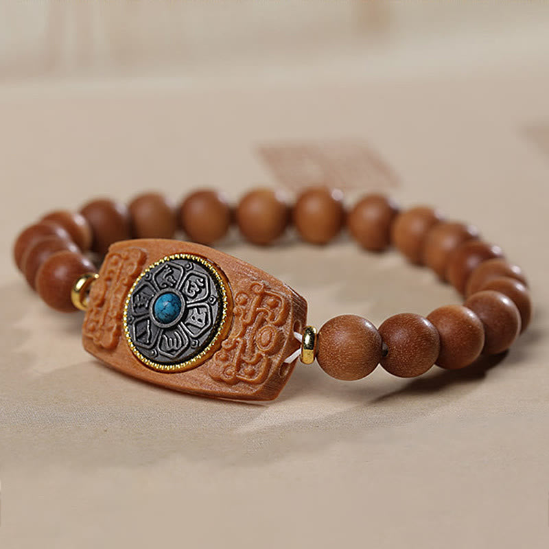 Bracelet de paix en six mots vrais en bois de santal rouge et vert avec petites feuilles de Buddha Stones