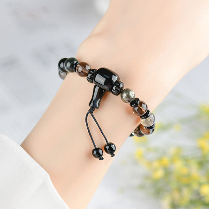 Bracelet de sagesse et de richesse en obsidienne noire avec Buddha Stones et cinq éléments