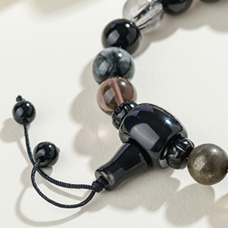 Bracelet de sagesse et de richesse en obsidienne noire avec Buddha Stones et cinq éléments