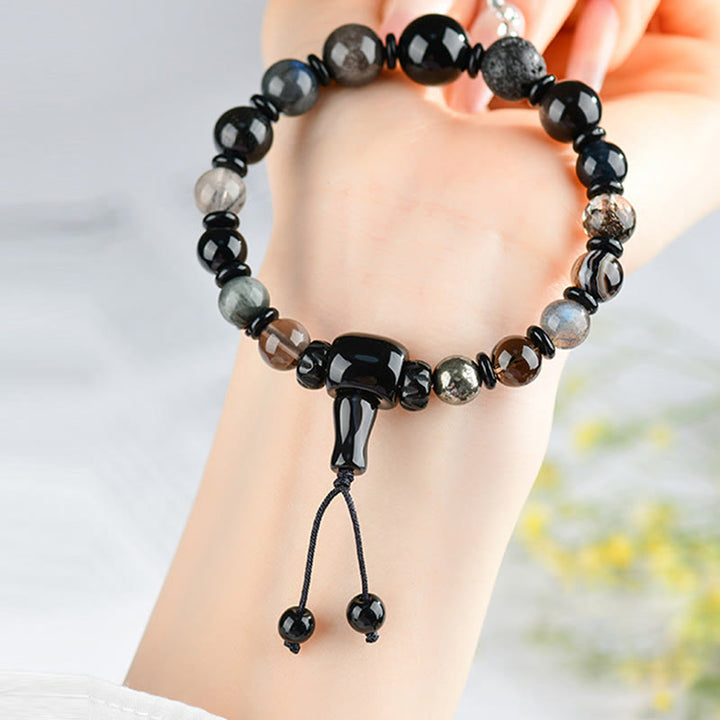 Bracelet de sagesse et de richesse en obsidienne noire avec Buddha Stones et cinq éléments