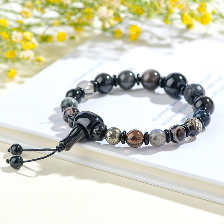 Bracelet de sagesse et de richesse en obsidienne noire avec Buddha Stones et cinq éléments