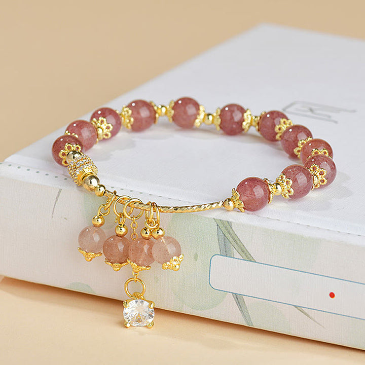 Bracelet de guérison positif en cristal de quartz fraise naturel et zircon Buddha Stones