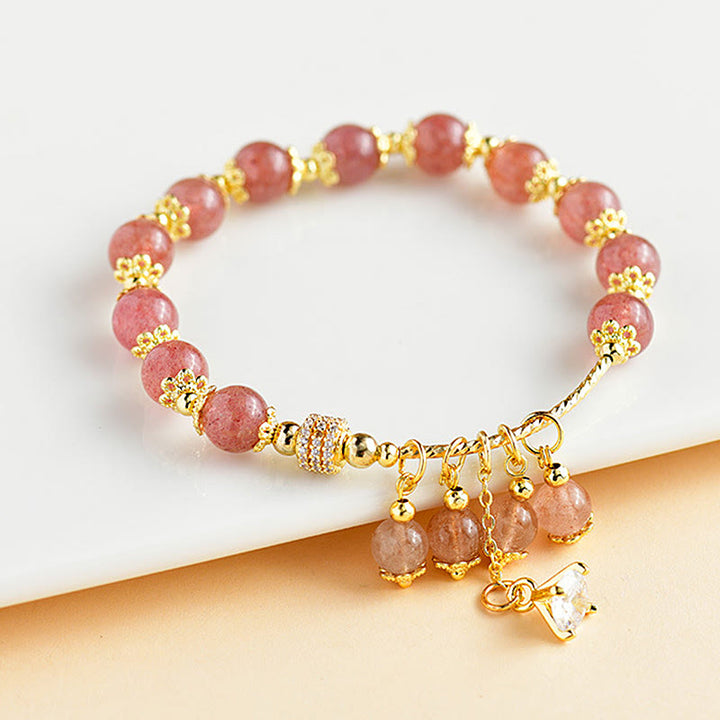 Bracelet de guérison positif en cristal de quartz fraise naturel et zircon Buddha Stones