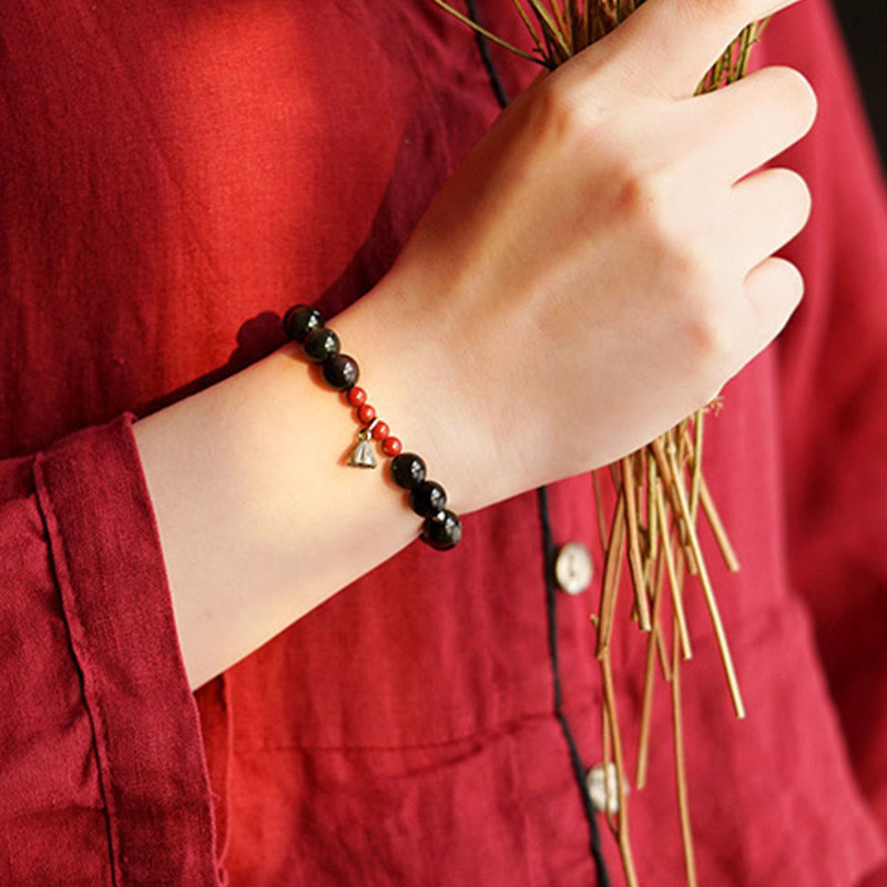 Bracelet de force et d'accomplissement en obsidienne noire naturelle et cinabre avec breloque lotus et Buddha Stones
