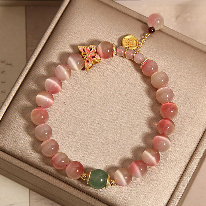 Bracelet de paix œil de chat papillon rose dégradé avec Buddha Stones
